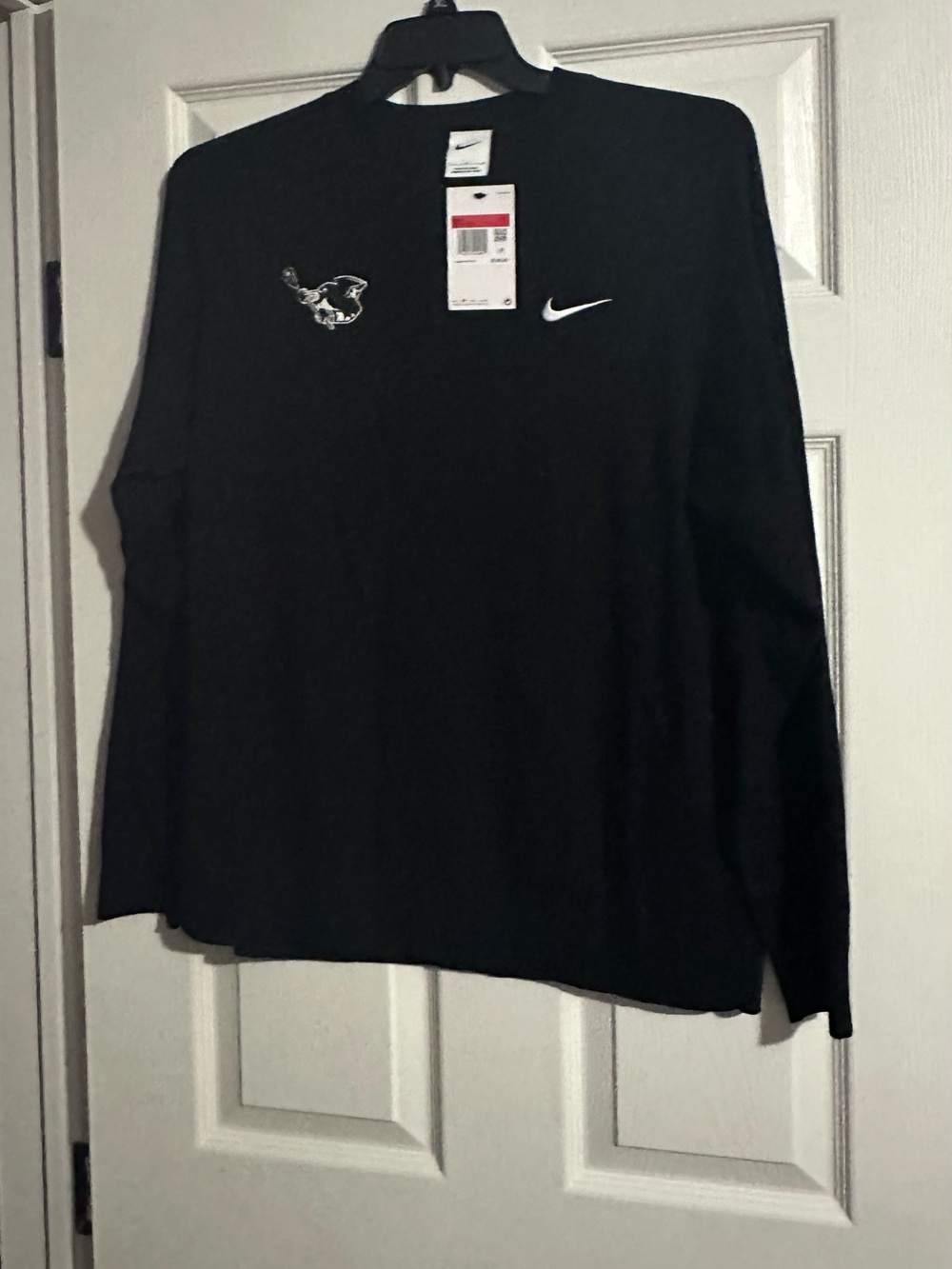 Nike Tiger Woods (TW) Collection long sleeve shirt is a size Large.